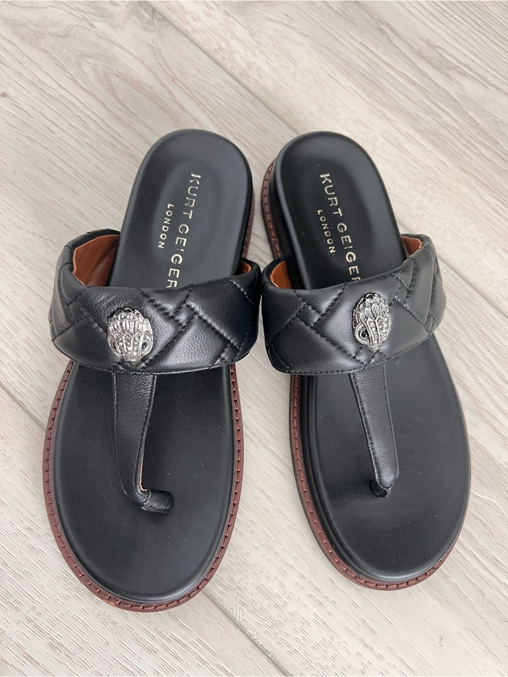 Kurt Geiger Black Quilted Toe-Post Sandals with Silver Emblem